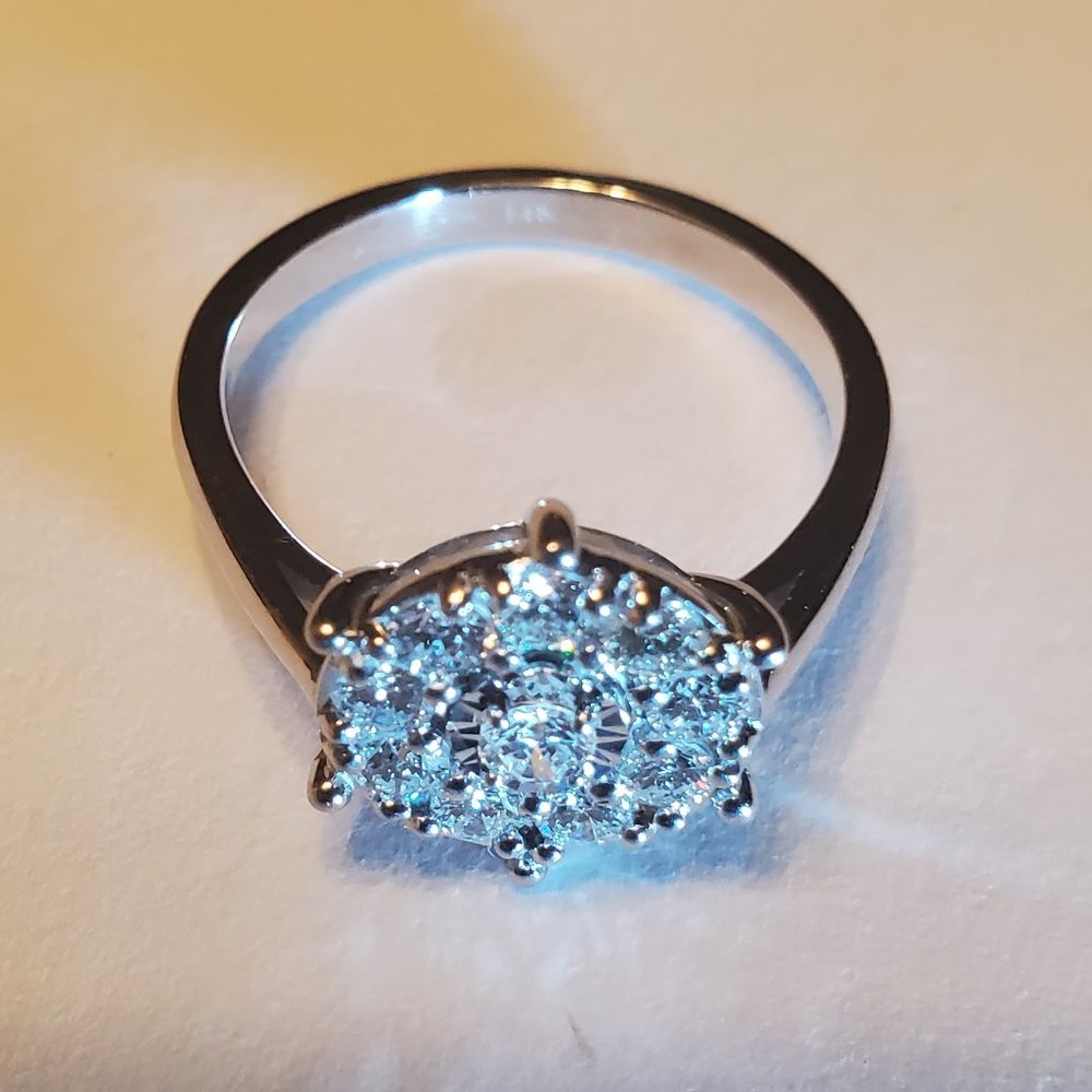 The brand new, beautiful design 14K white gold diamond ring